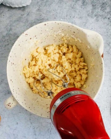 vanilla cookie dough in a white cup.