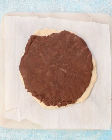 chocolate and vanilla cookie dough in a white paper. 