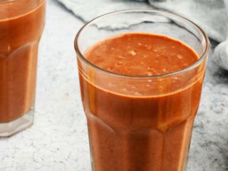 creamy chocolate smoothie made with avocado in glasses