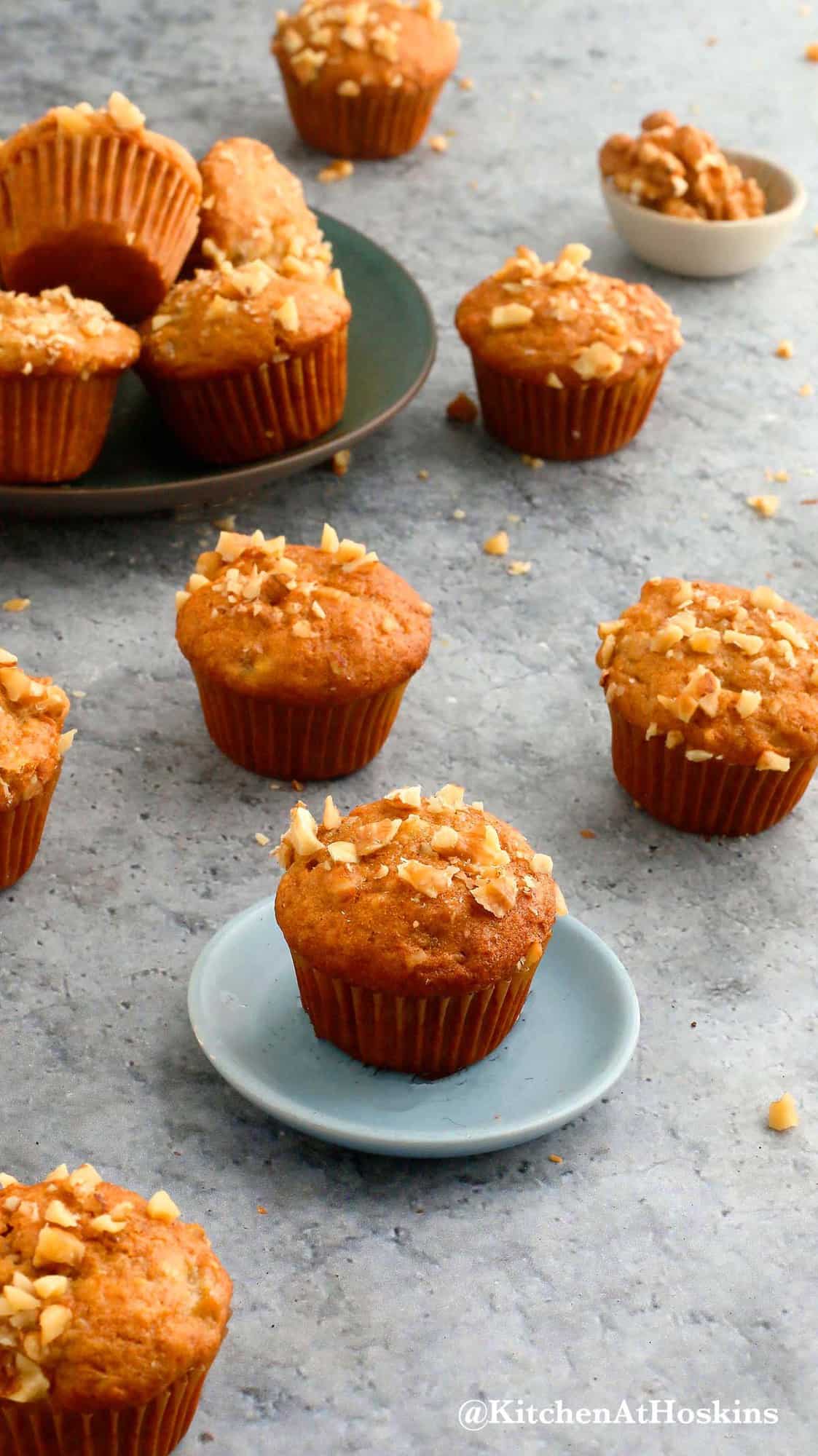 mini banana walnut muffins on green and blue plates.