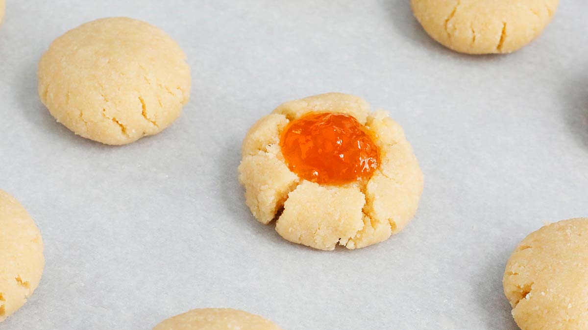 apricot jam in the middle of shaped vegan dough.