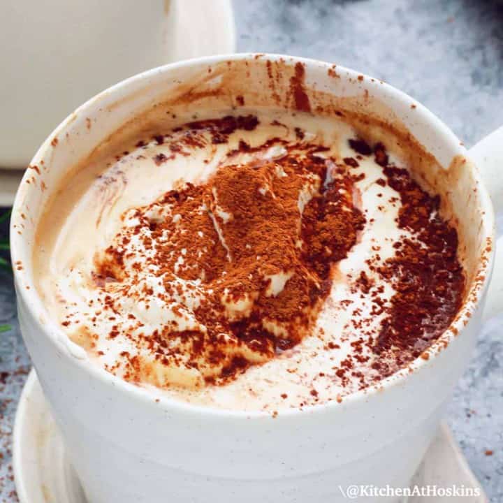 white mug with mocha latte.