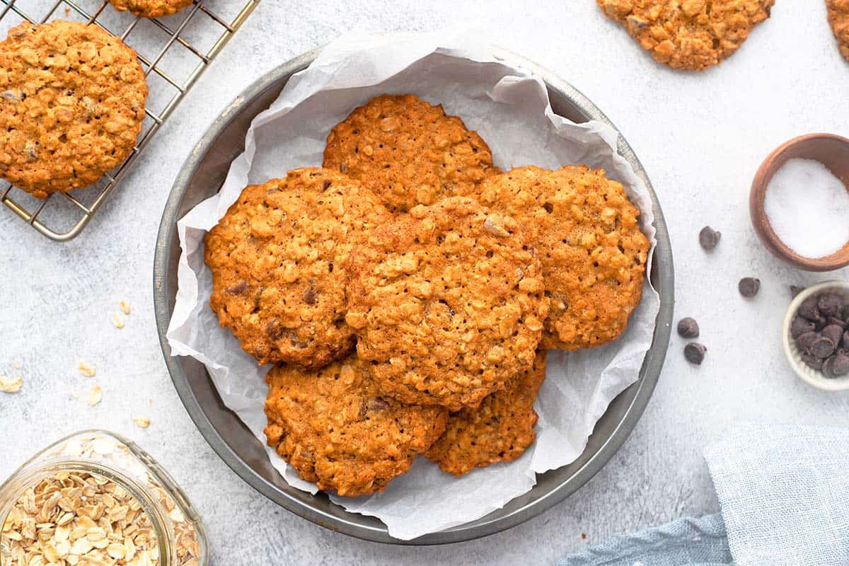 Metal plate with egg free  oatmeal cookies. 