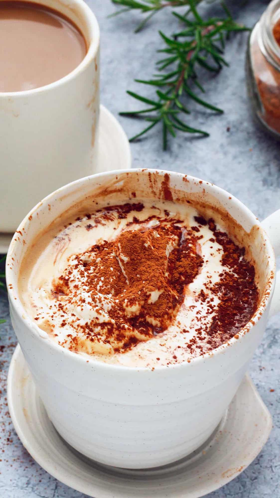 white mugs with coffee mocha latte.
