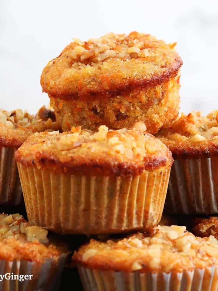 almond flour carrot muffins piled high.