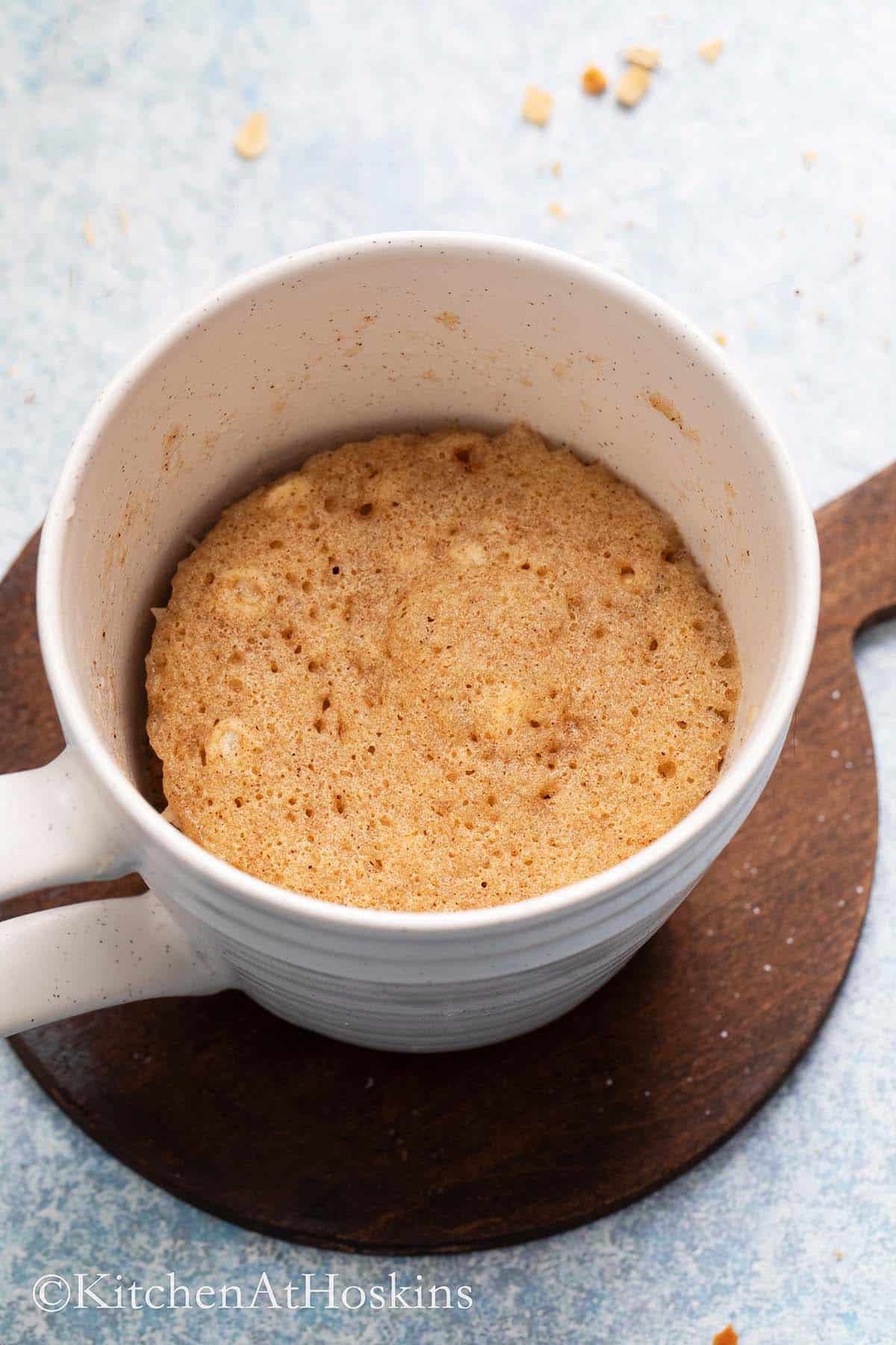 white mug with microwave mug cake.