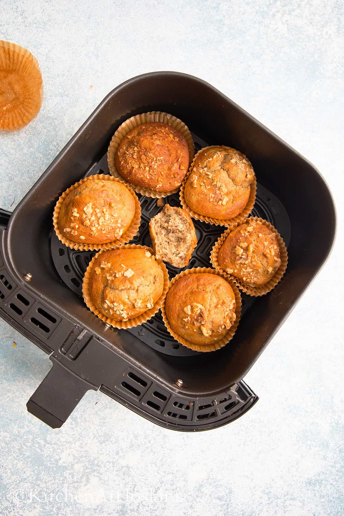 baked muffins in air fryer basket. 