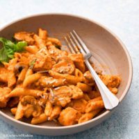 chicken and mushroom pasta in a bowl.