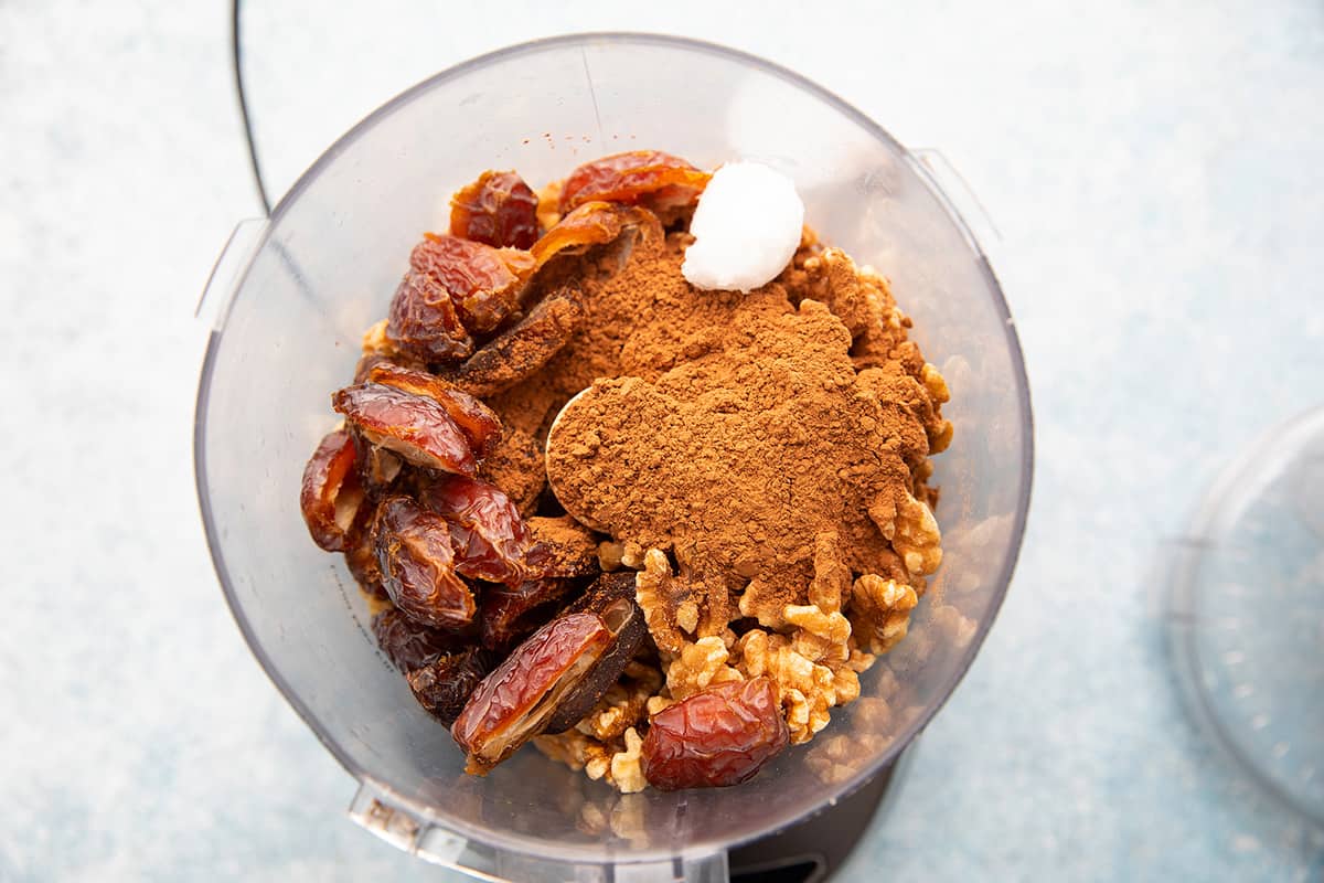 pitted dates, walnuts and cocoa powder in a food processor. 