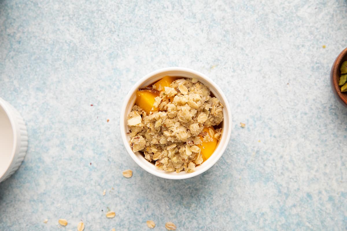 diced fresh mango topped with oatmeal crust.