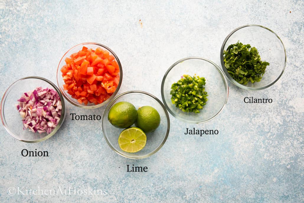 ingredients needed to make fresh tomato salsa. 