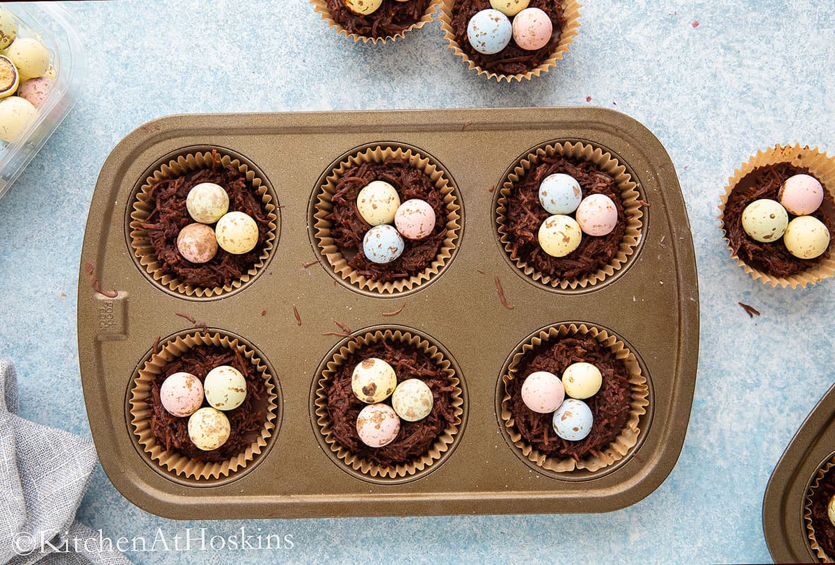 muffin pan with birds nests. 