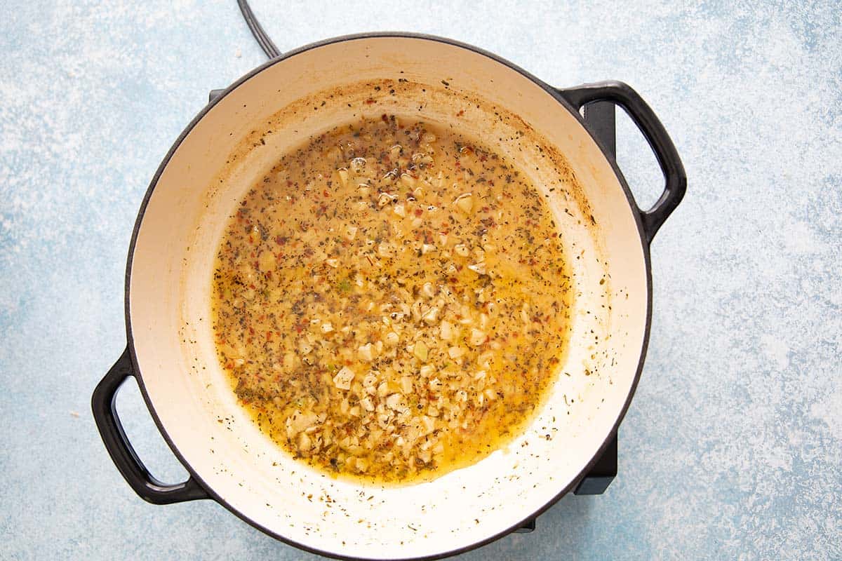 garlic butter sauce simmering in a pan.
