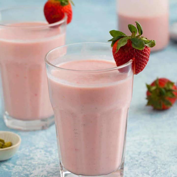 glasses filled with strawberry lassi.