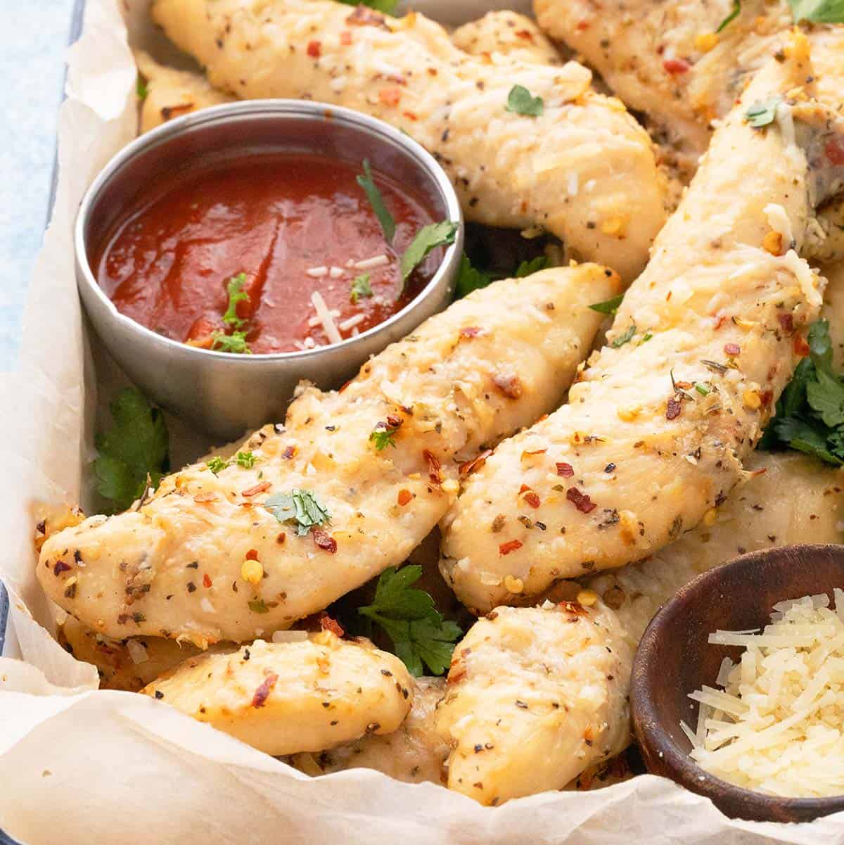 a tray with garlic parmesan chicken tenders.