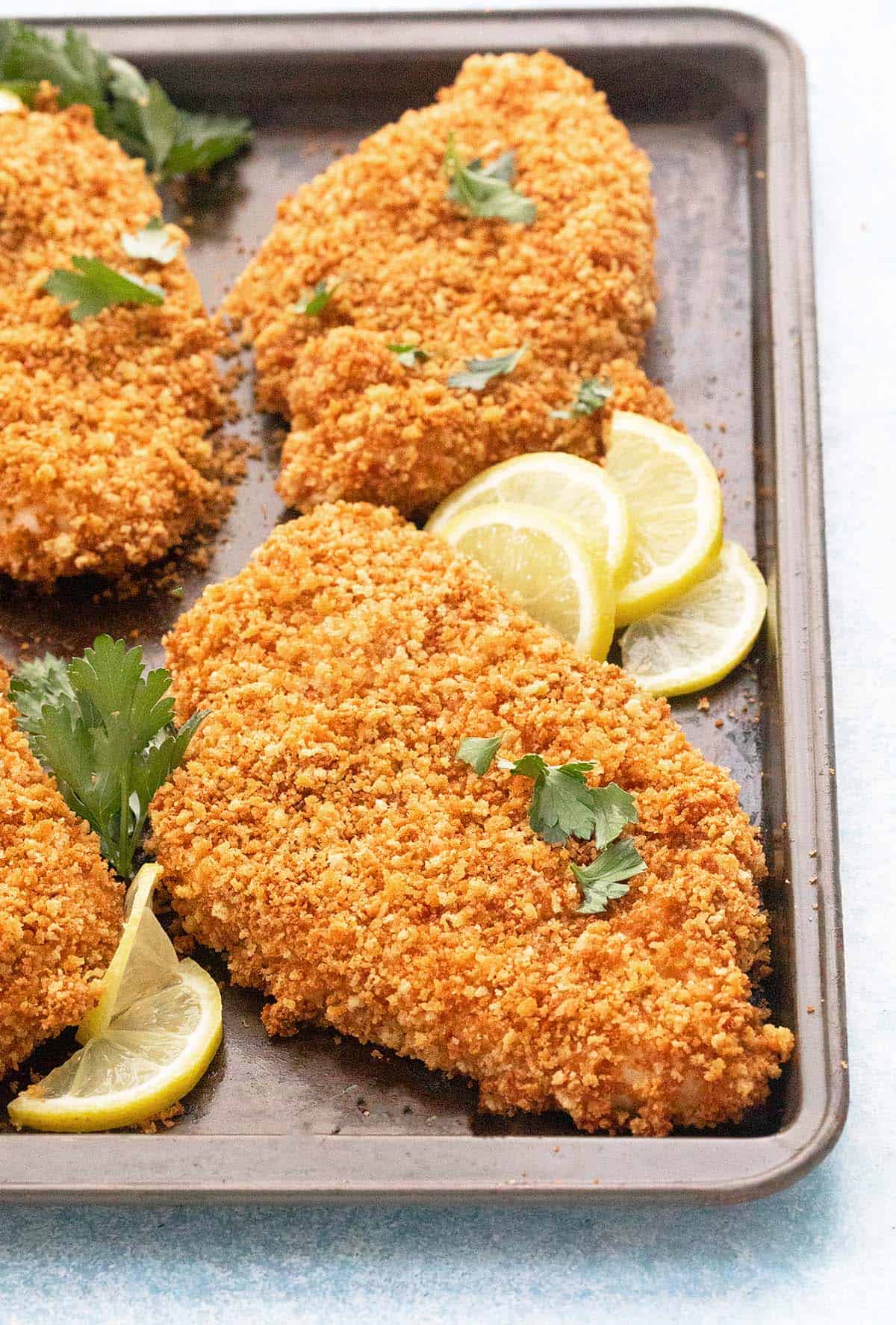baked chicken cutlets in a baking pan. 