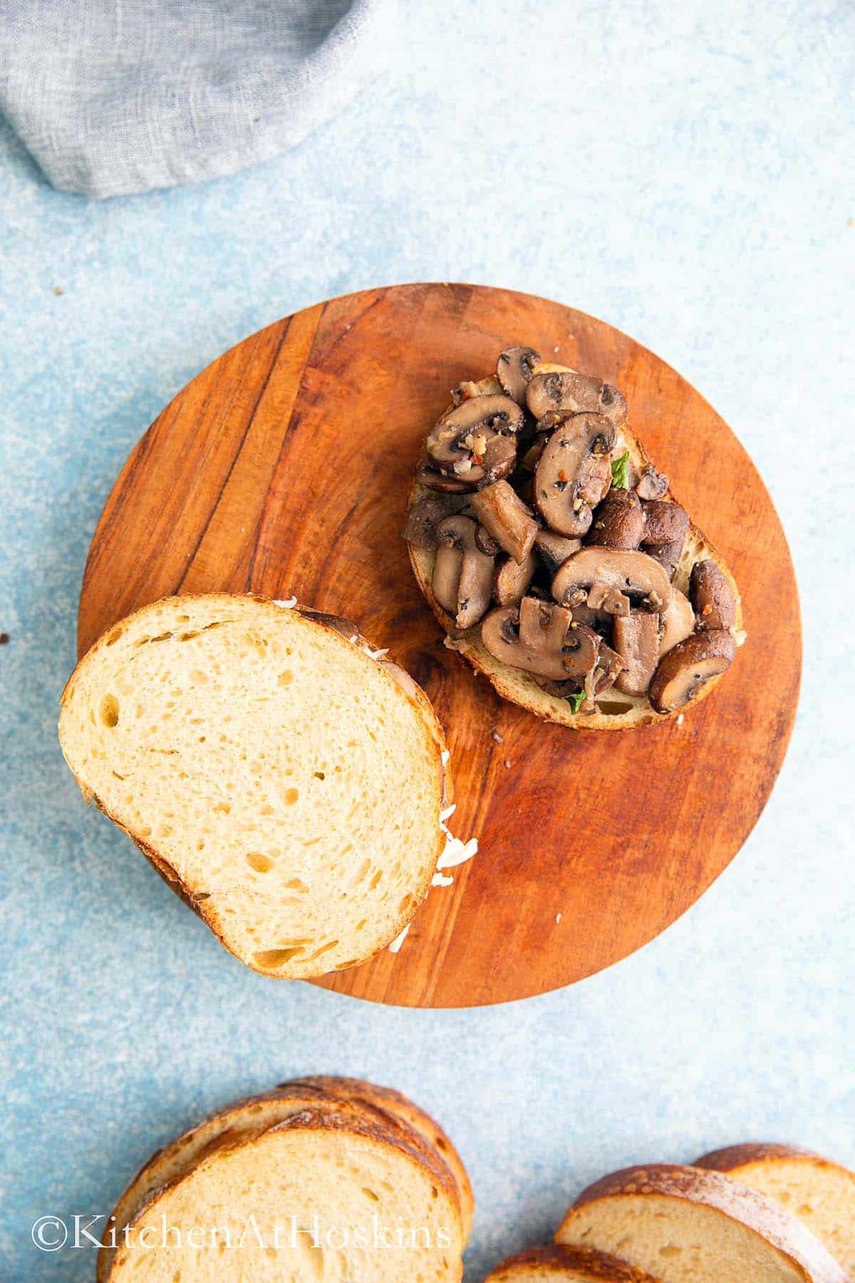 cooked sautéed mushrooms placed on a bread to build a sandwich.