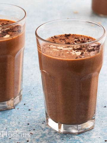 chocolate oatmeal smoothie in glasses.