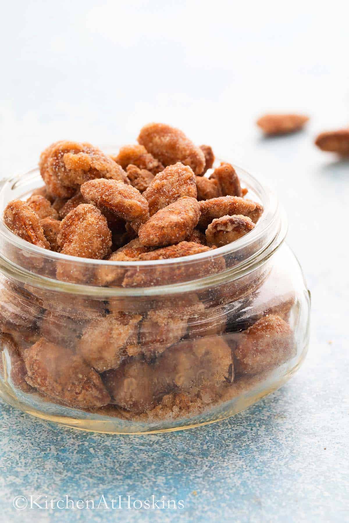 mason jar filled with sugar coated almonds.