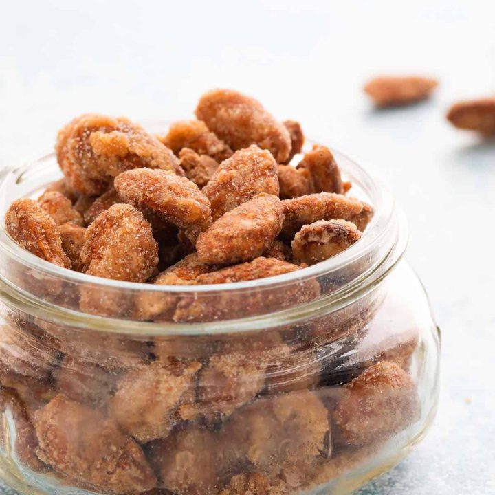 glass jar filled with candied almonds.