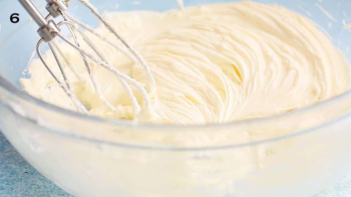 whipped cream cheese in a glass bowl.