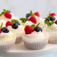 mini cheesecakes on a round board.