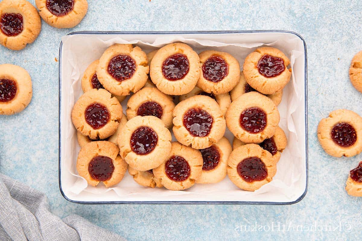 white tray filled with jam cookies.