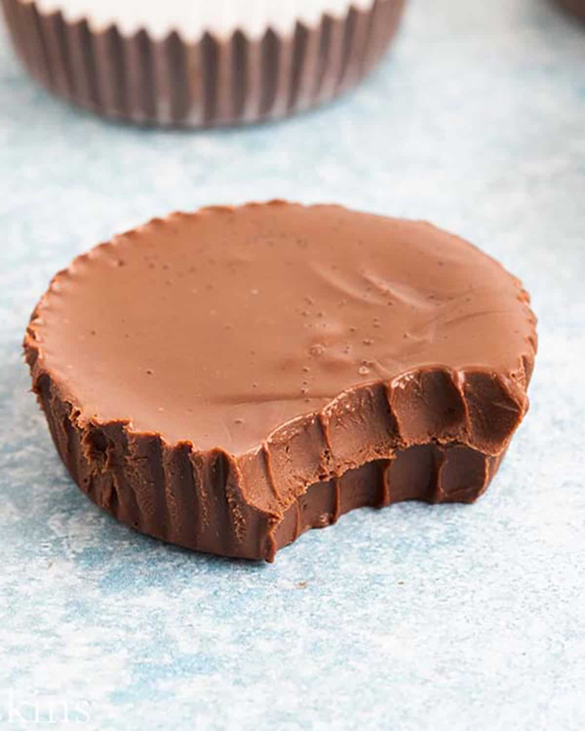 one sunbutter cup in a blue board.