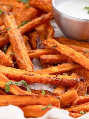 carrot fries on a white plate.