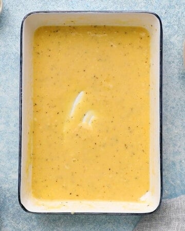 yellow batter in a white rectangle dish.