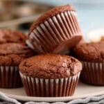 almond flour chocolate muffins on a grey plate.