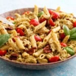 chicken pasta salad in a brown bowl.