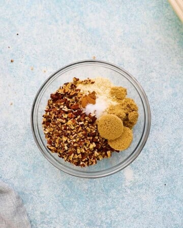 chopped pecans, brown sugar and almond flour in a small glass bowl.