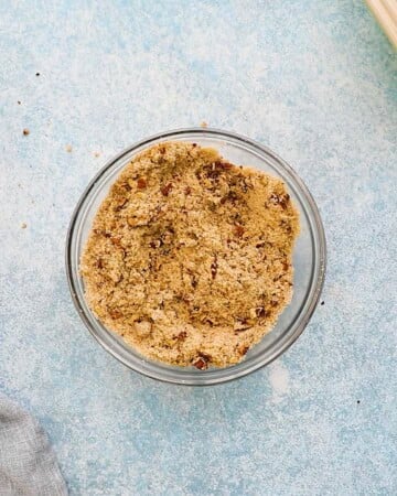 combined brown sugar crumble topping in a small glass bowl.