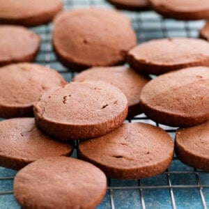 chocolate shortbread cookies on a wire rack.