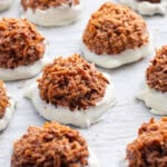 chocolate coconut macaroons in a white tray.
