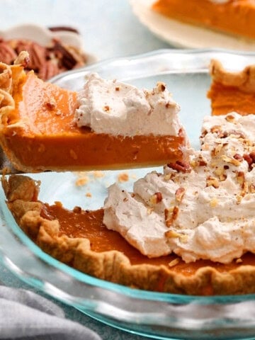 sweet potato pie in a glass pie pan.