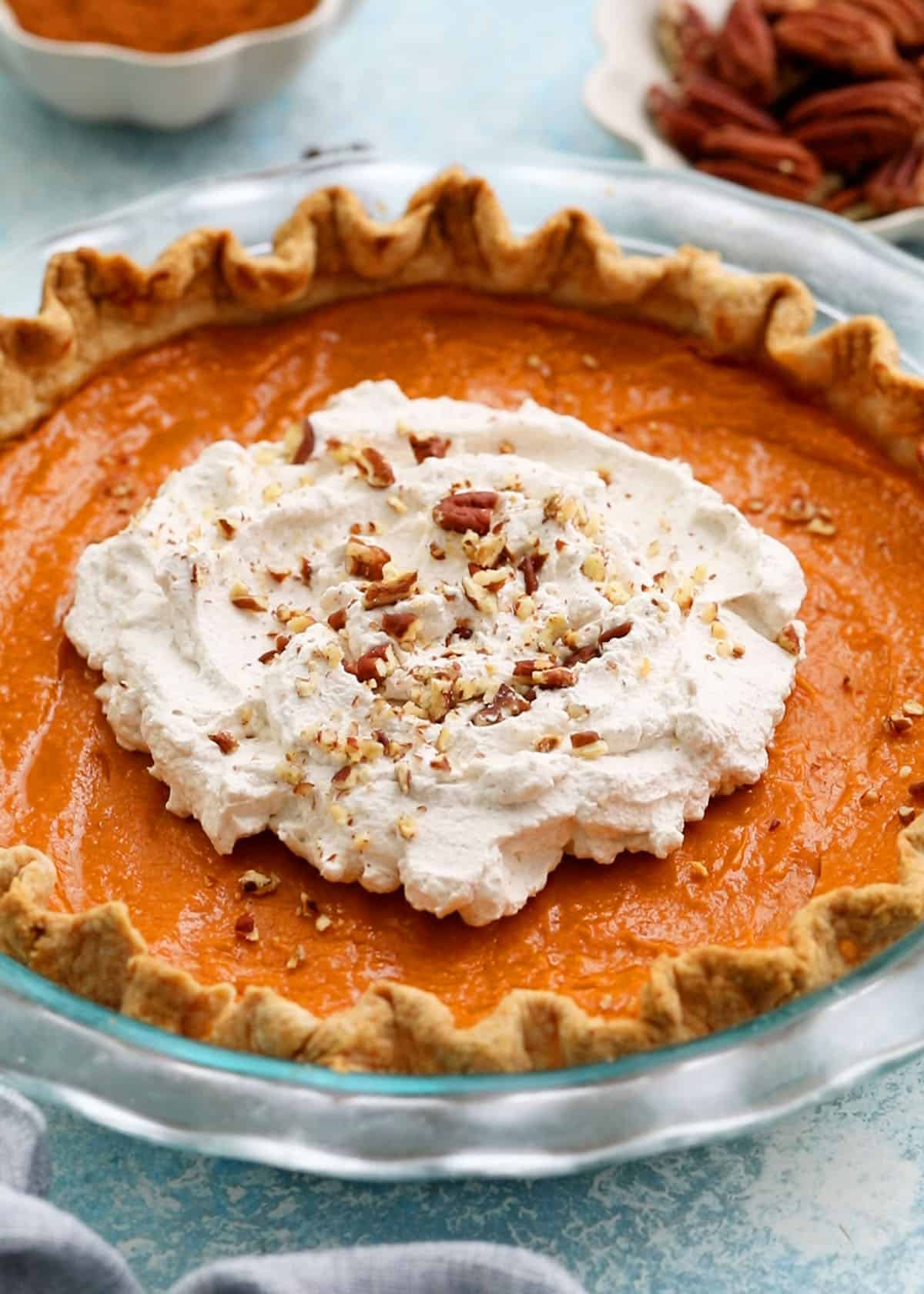 sweet potato pie in a glass pie pan.