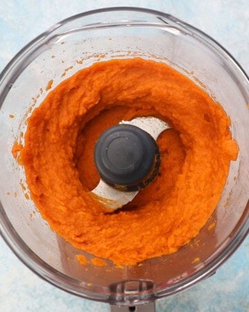 pureed sweet potatoes in a food processor.