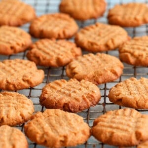 almond butter cookies on a wire rack.