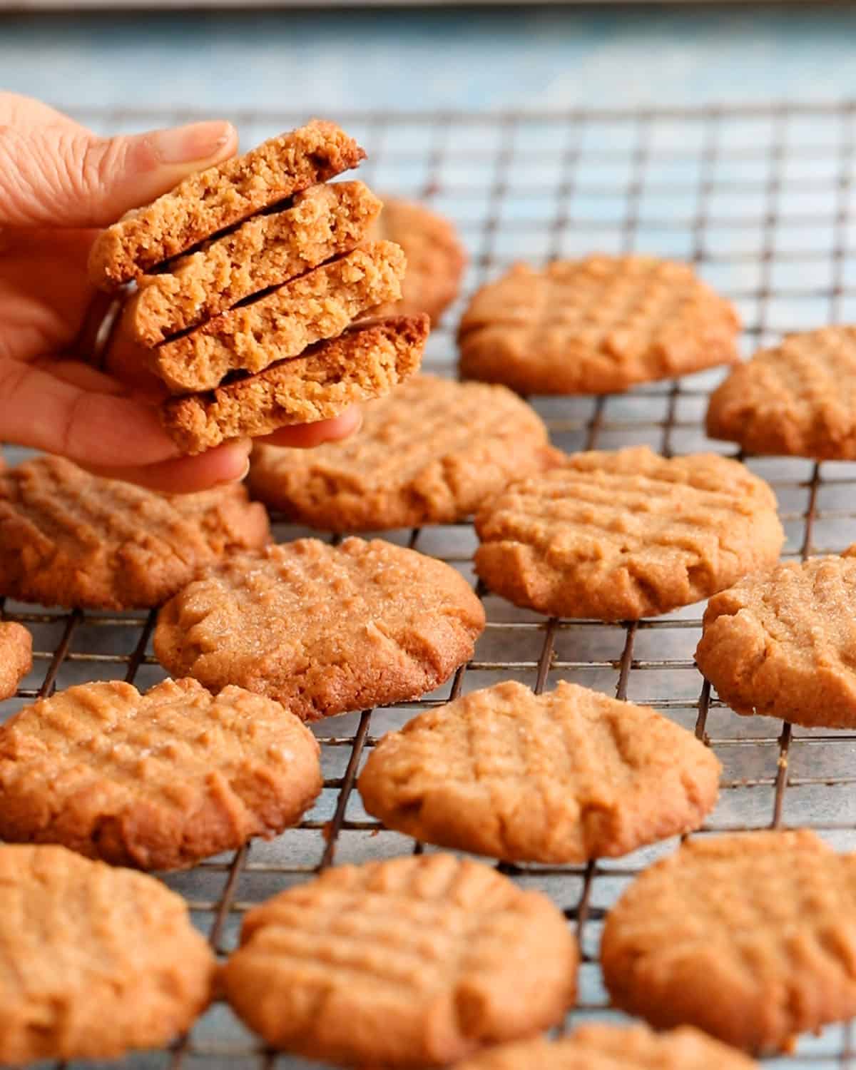 almond butter cookies on a wire rack.