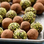 chocolate avocado truffles in a baking sheet.