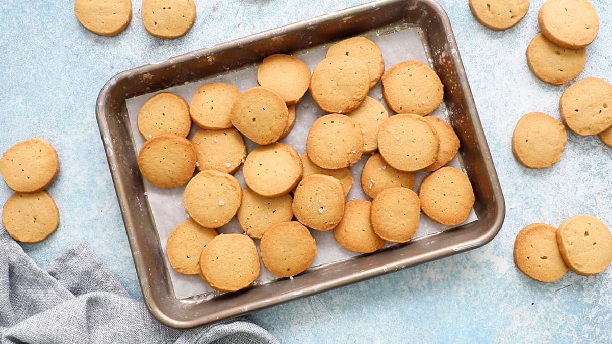 baked brown sugar cookies in a metal baking sheet.