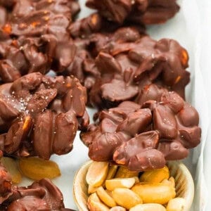 peanut clusters in a white tray.