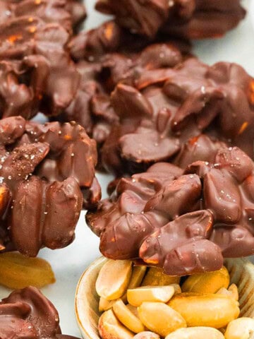 peanut clusters in a white tray.