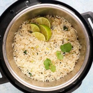 white and green cilantro lime rice in an instant pot.