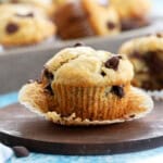 one banana chocolate chip muffin in a brown board.