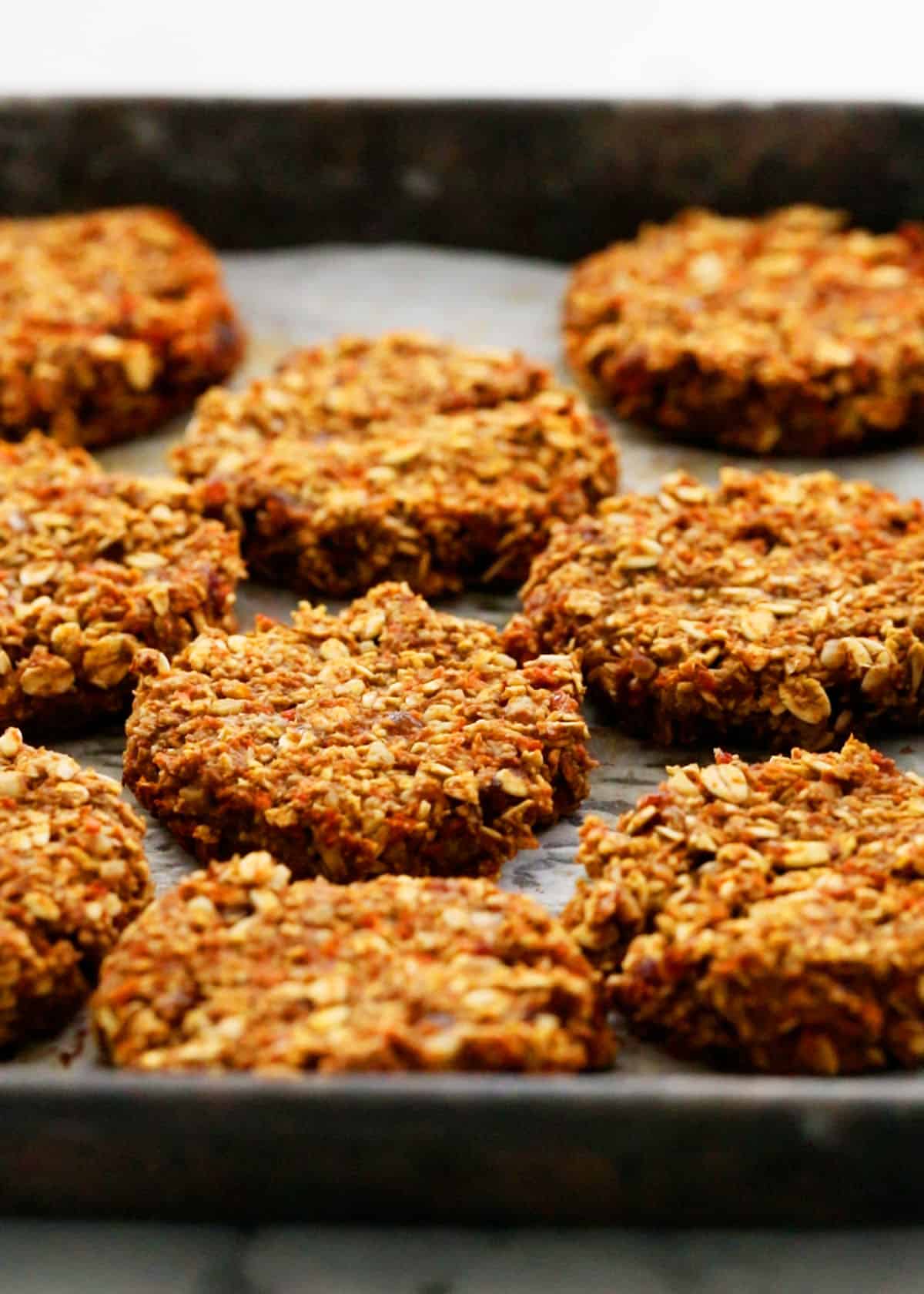 carrot oatmeal cookies in a baking sheet.