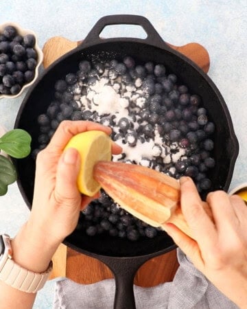 blueberries in a black skillet.