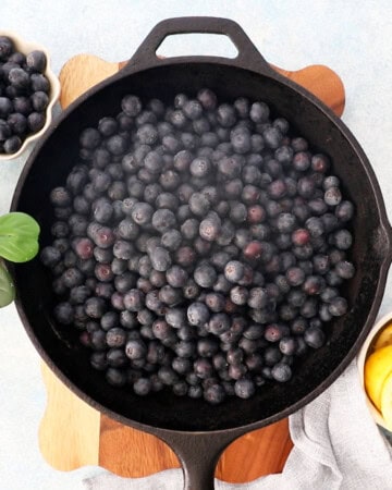 blueberries in a black skillet.
